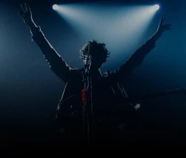 A man playing a guitar